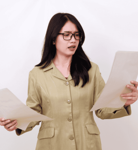 woman holding multiple documents